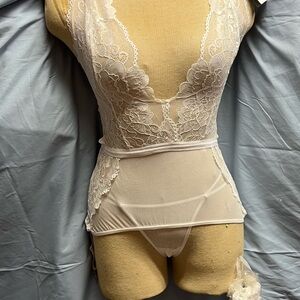 Elegant Lace Bodysuit in White with Panty and White Hosiery.